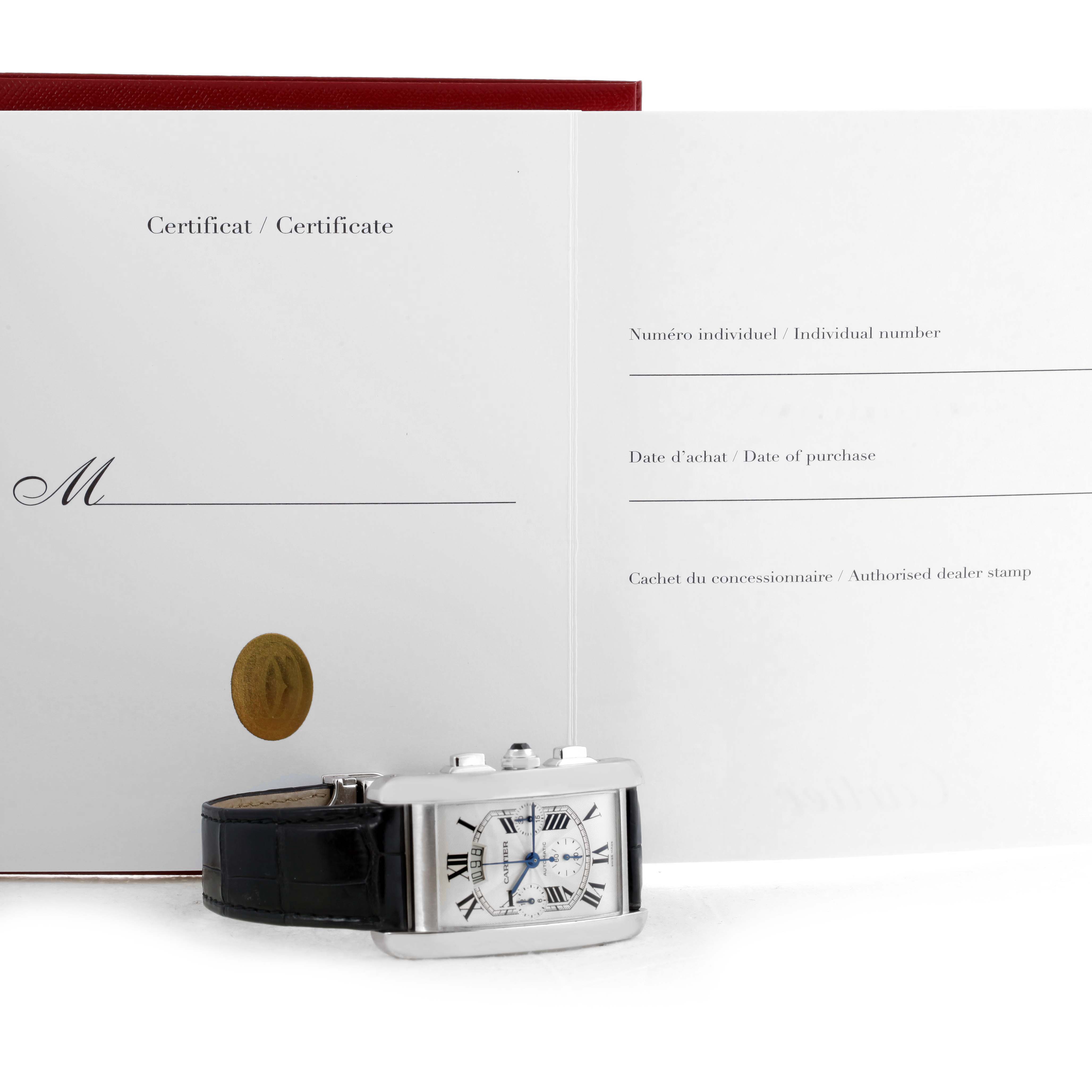 The Cartier Tank Americaine W2609456 Men's White Gold Silver Dial W2609456 Men's White Gold Silver Dial watch is shown lying flat with the certificate of authenticity in the background.