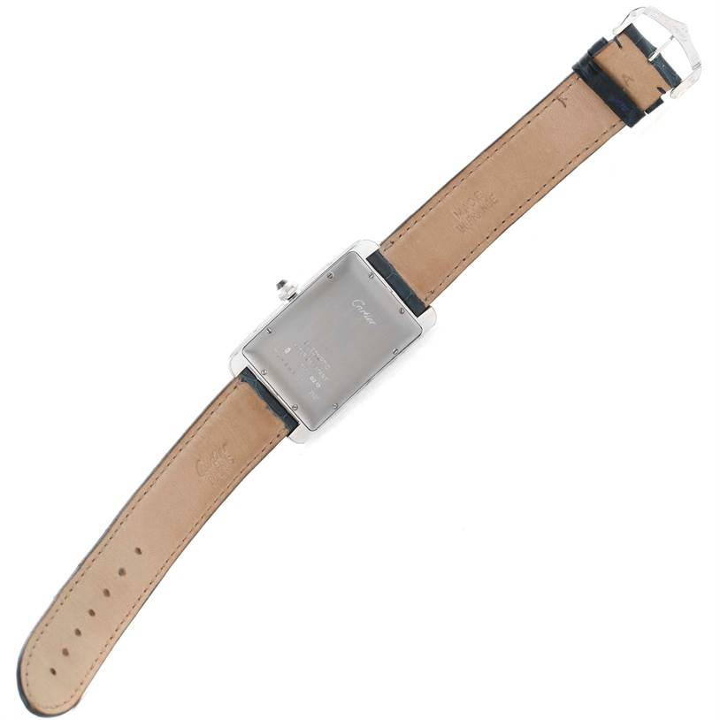 The image shows the back and strap of the Cartier Tank Americaine W2603256 Men's White Gold Silver Dial W2603256 Men's White Gold Silver Dial watch, displayed flat and face-down.