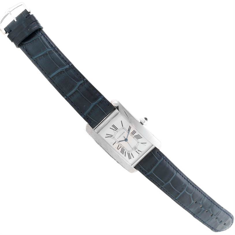 The Cartier Tank Americaine W2603256 Men's White Gold Silver Dial W2603256 Men's White Gold Silver Dial watch is shown angled slightly to the right, displaying the dial, casing, and leather strap.