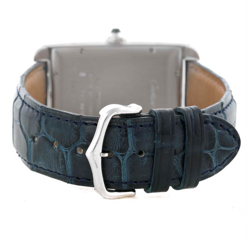 The image shows the back view of a Cartier Tank Americaine W2603256 Men's White Gold Silver Dial W2603256 Men's White Gold Silver Dial watch, focusing on the clasp and leather strap.