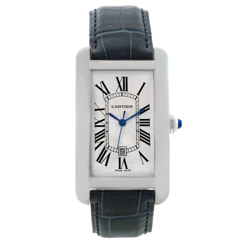 The image shows a Cartier Tank Americaine W2603256 Men's White Gold Silver Dial W2603256 Men's White Gold Silver Dial watch from a front angle, highlighting its face, bezel, and leather strap.