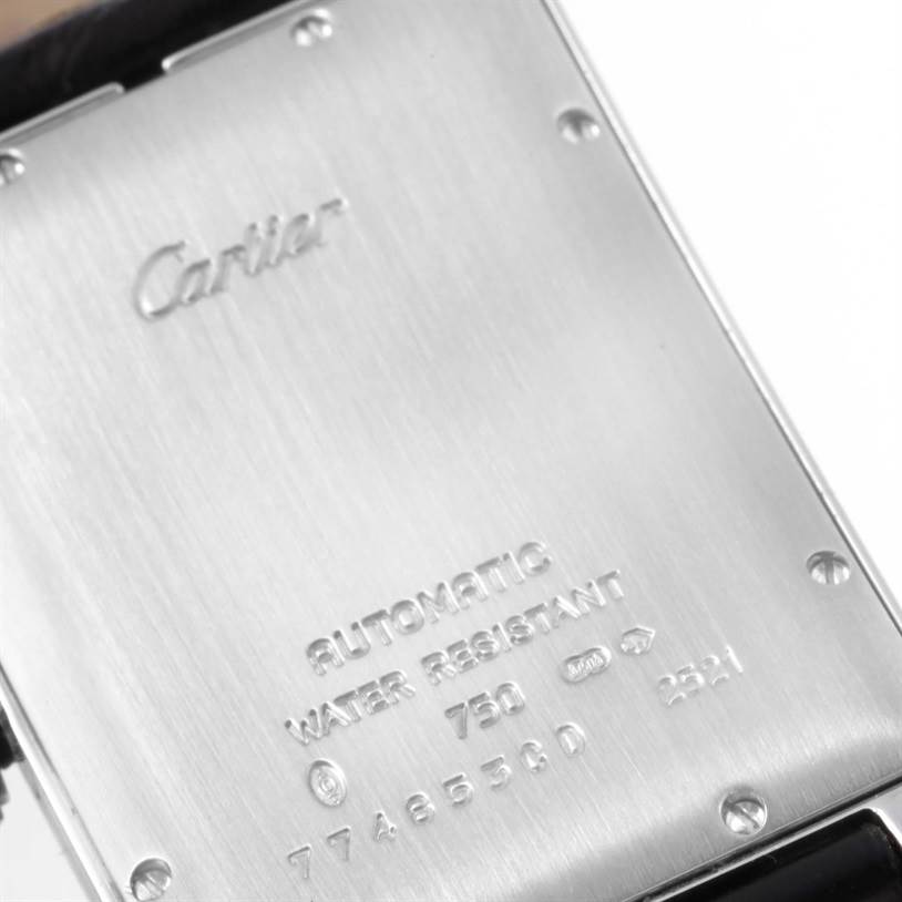 The image shows the back case of the Cartier Tank Americaine W2603256 Men's White Gold Silver Dial W2603256 Men's White Gold Silver Dial watch with engraved details.