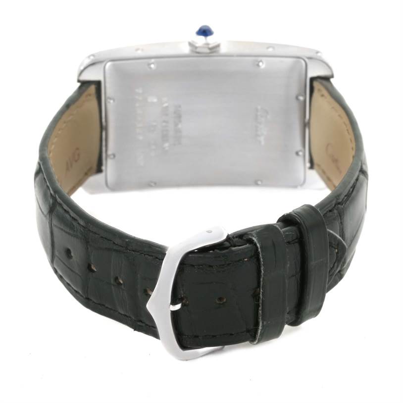 The image shows the back of a Cartier Tank Americaine W2603256 Men's White Gold Silver Dial W2603256 Men's White Gold Silver Dial watch, focusing on the caseback and leather strap.