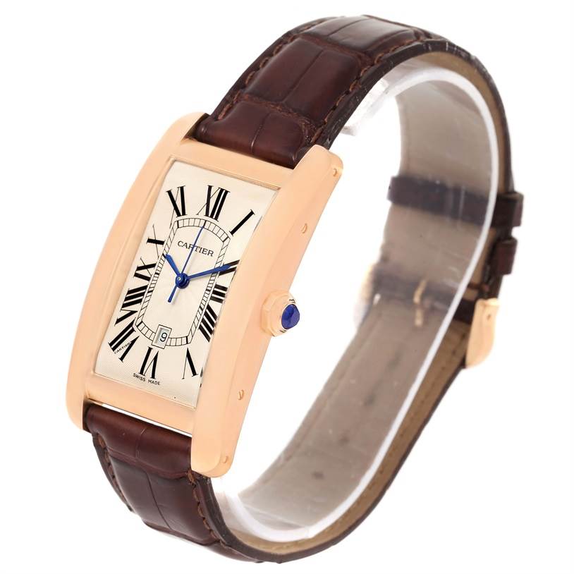 The image shows a Cartier Tank Americaine W2609156 Rose Gold Silver Dial W2609156 Rose Gold Silver Dial watch at a slightly tilted angle, highlighting the face, crown, and brown leather strap.