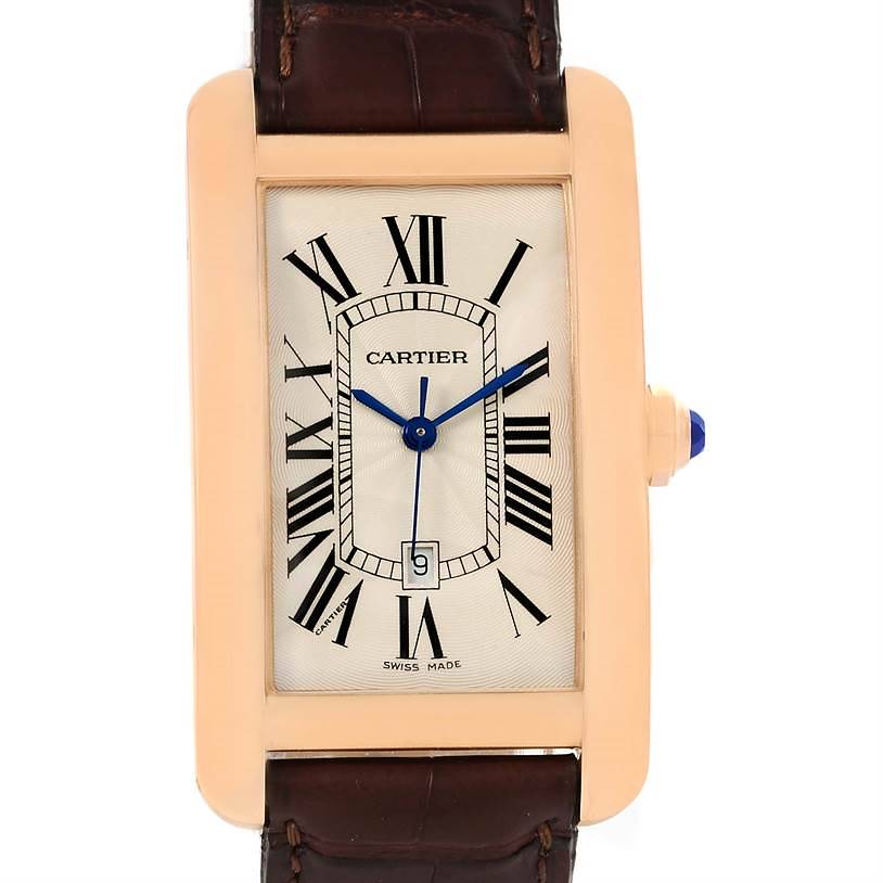 This image shows a frontal view of the Cartier Tank Americaine watch, highlighting its rectangular face, Roman numeral markers, and leather strap.