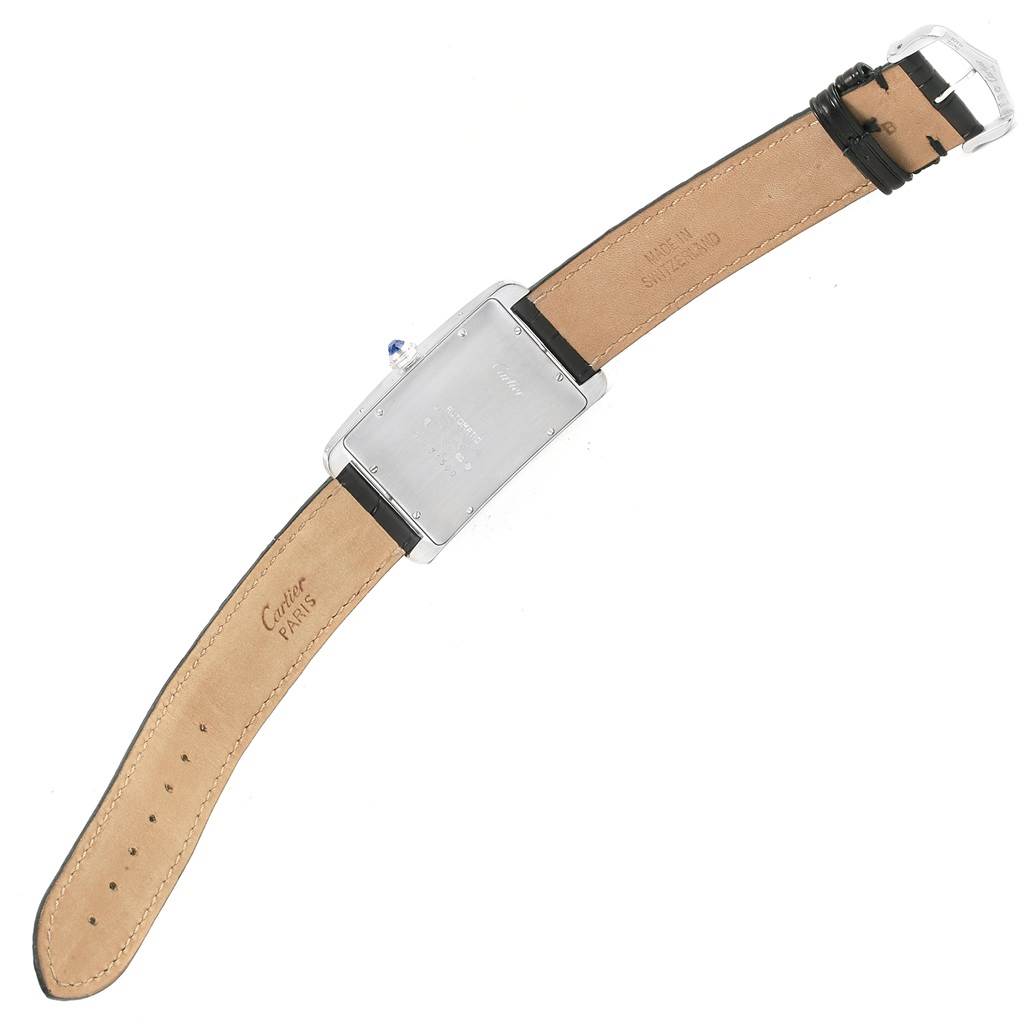 The image shows the back side and leather strap of a Cartier Tank Americaine W2603256 Men's White Gold Silver Dial W2603256 Men's White Gold Silver Dial watch.