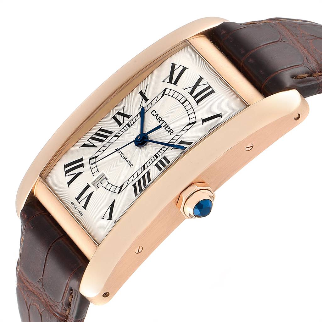 The image shows a Cartier Tank Americaine W2609856 Men's Rose Gold Silver Dial W2609856 Men's Rose Gold Silver Dial watch, featuring its face, crown, and leather strap from a slightly angled side view.
