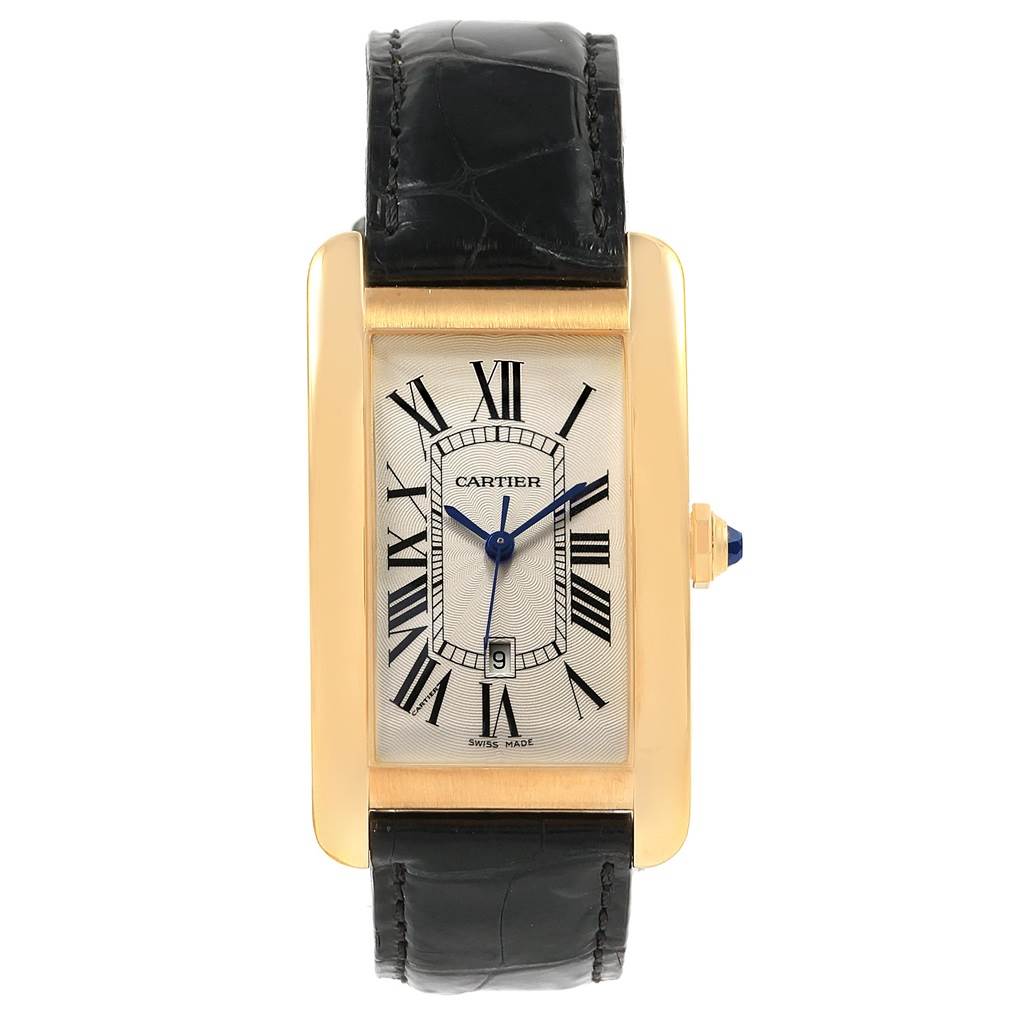 The image shows a frontal view of the Cartier Tank Americaine W2603156 Men's Yellow Gold Silver Dial W2603156 Men's Yellow Gold Silver Dial watch, displaying its rectangular dial, gold case, Roman numerals, and black leather strap.