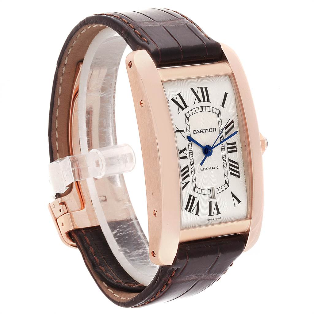 The Cartier Tank Americaine W2609856 Men's Rose Gold Silver Dial W2609856 Men's Rose Gold Silver Dial watch is shown at a three-quarter angle, highlighting its strap, case, dial, and clasp.