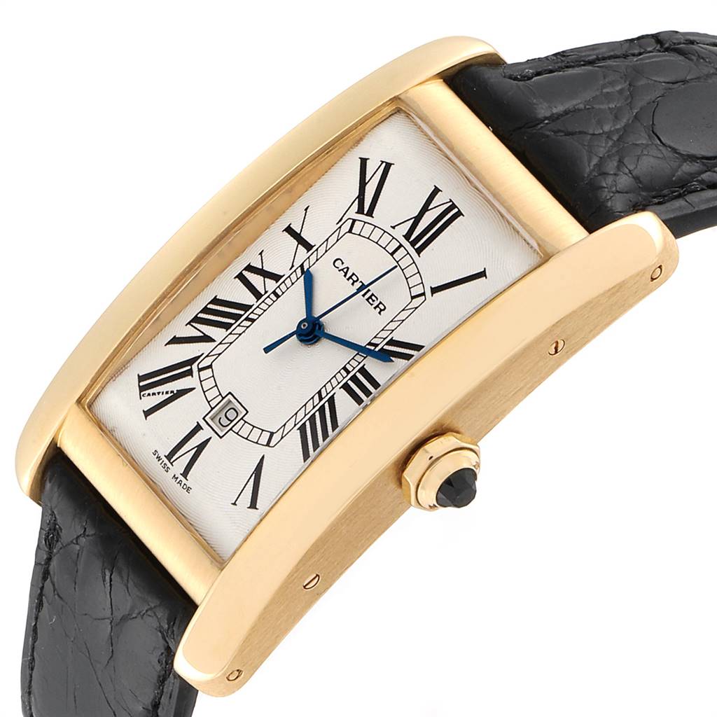 The Cartier Tank Americaine W2603156 Men's Yellow Gold Silver Dial W2603156 Men's Yellow Gold Silver Dial watch is shown at a slight angle, highlighting its rectangular face, Roman numerals, and leather strap.