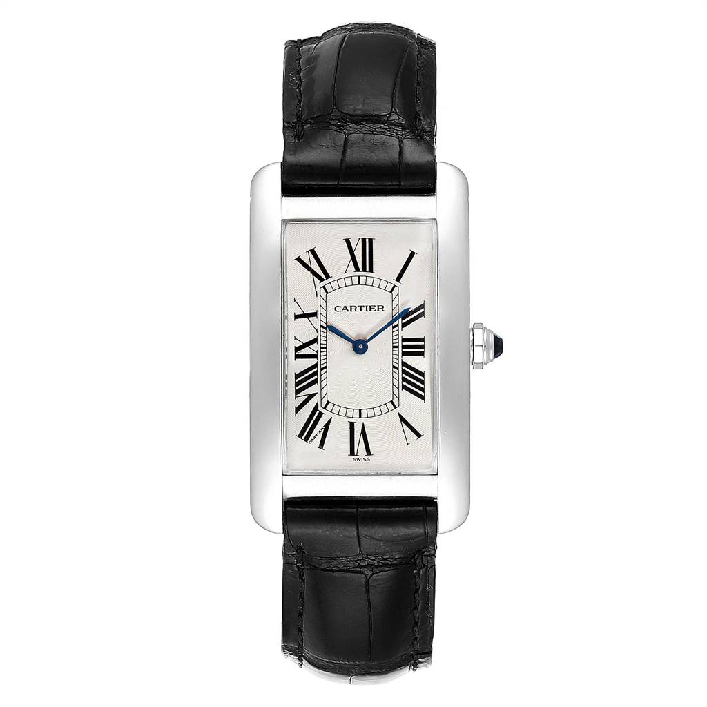 The image shows a frontal view of a Cartier Tank Americaine W2604351 Men's Platinum Silver Dial W2604351 Men's Platinum Silver Dial watch, highlighting the rectangular face, Roman numerals, and black leather strap.