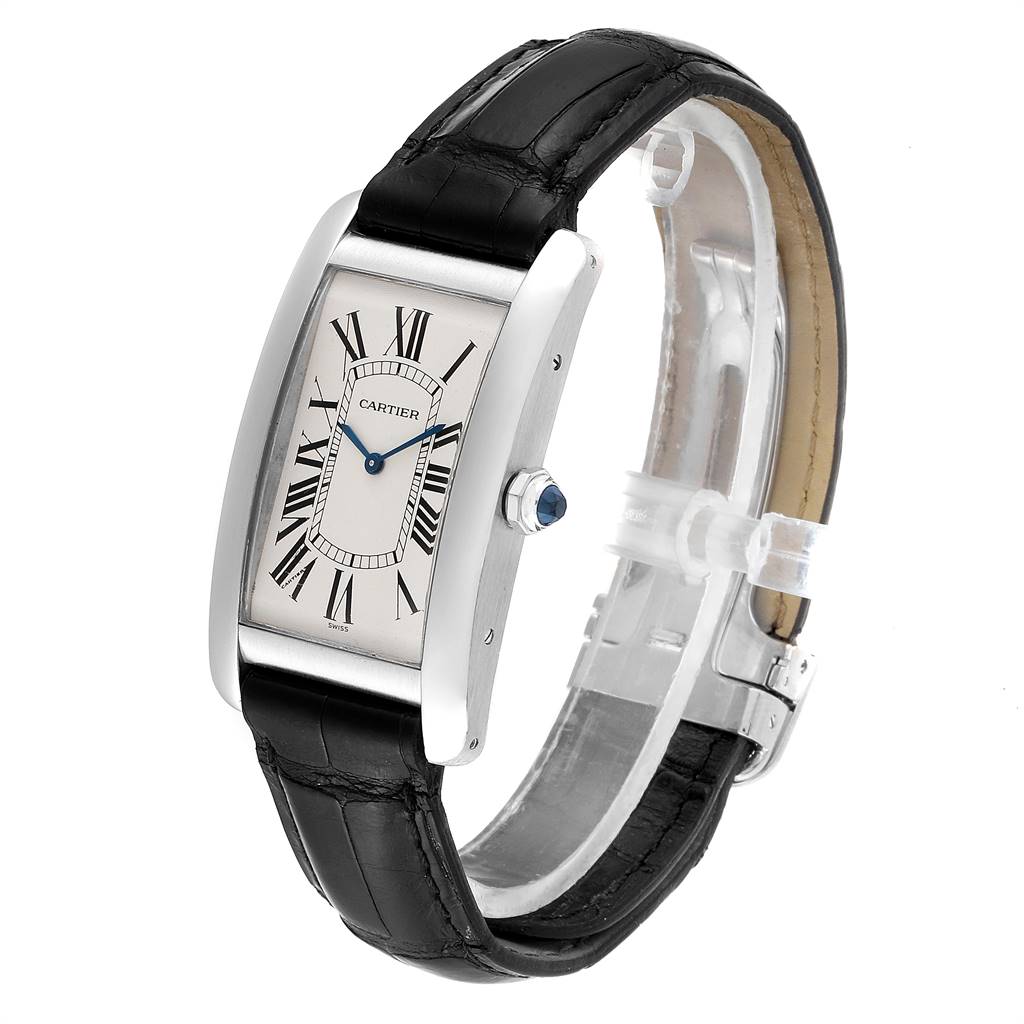 The image shows a Cartier Tank Americaine W2604351 Men's Platinum Silver Dial W2604351 Men's Platinum Silver Dial watch from a side-front angle, highlighting its face, case, and leather strap.