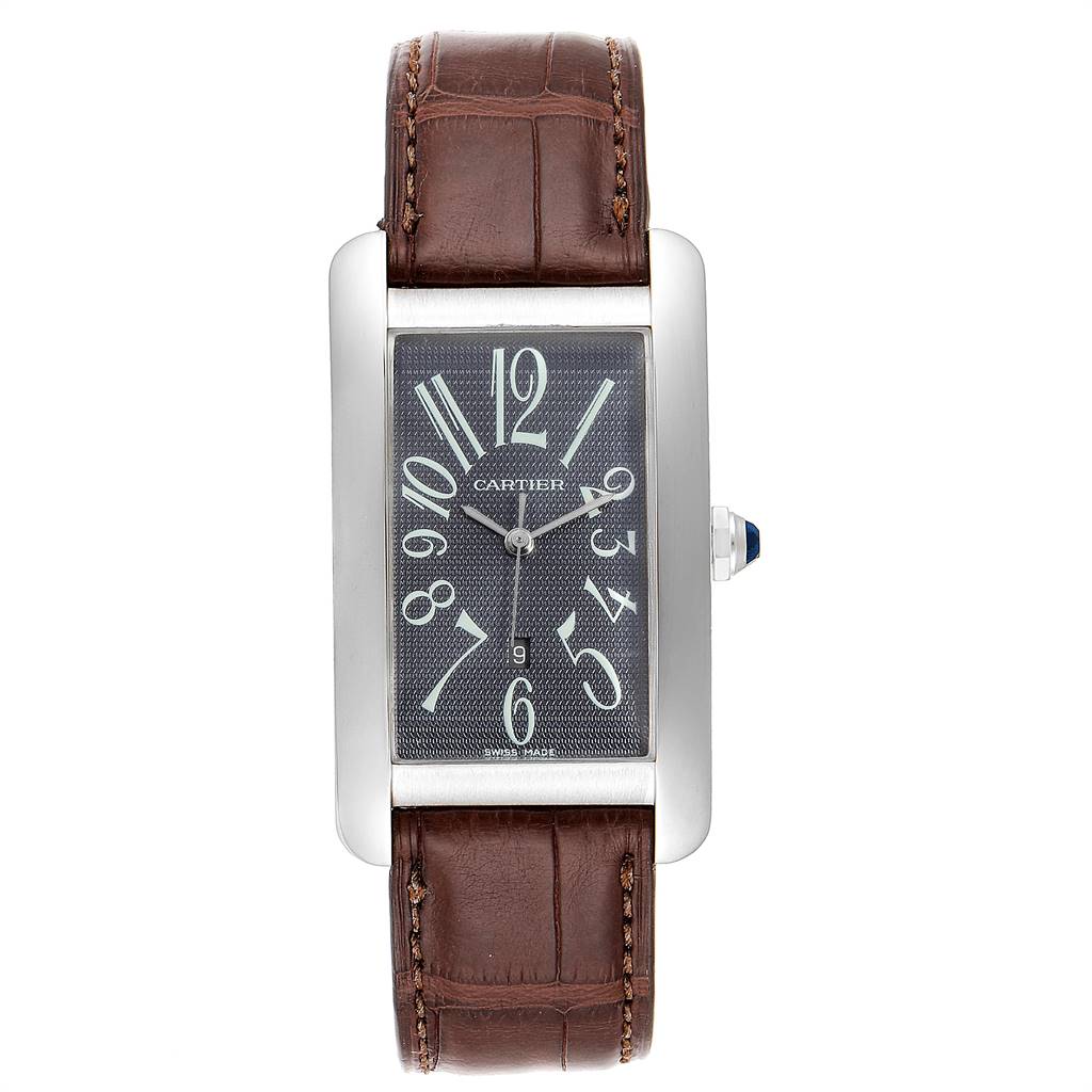 The image shows a Cartier Tank Americaine W2605229 Men
s White Gold Grey Dial W2605229 Men
s White Gold Grey Dial watch from a top-down angle, displaying its rectangular face and leather strap.