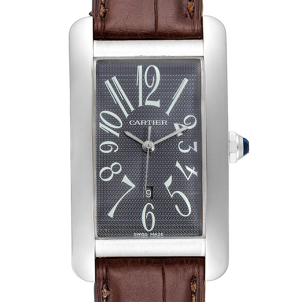 The image shows a front view of the Cartier Tank Americaine W2605229 Men
s White Gold Grey Dial W2605229 Men
s White Gold Grey Dial watch, highlighting its rectangular face and brown leather strap.