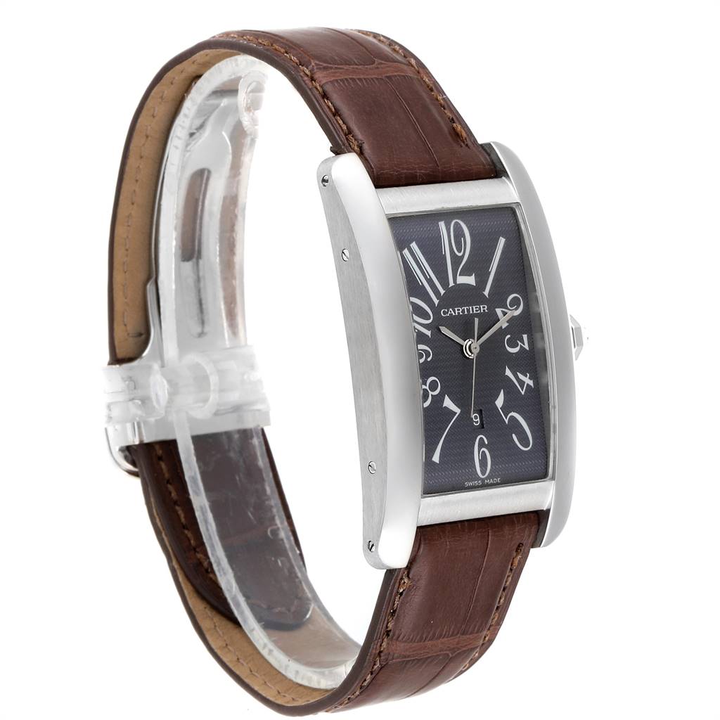 The image shows a Cartier Tank Américaine watch at an angle highlighting the front dial, case, and brown leather strap.