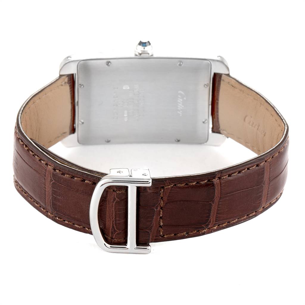 This image shows the back of a Cartier Tank Americaine W2605229 Men
s White Gold Grey Dial W2605229 Men
s White Gold Grey Dial watch, highlighting its leather strap and clasp.