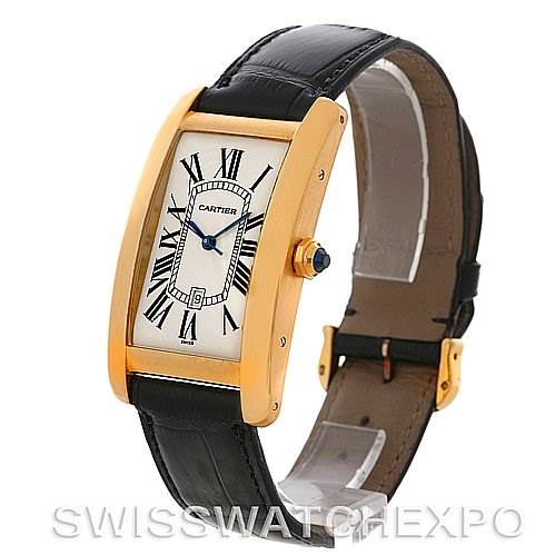 The image shows a Cartier Tank Americaine W2603156 Men
s Yellow Gold Silver Dial W2603156 Men
s Yellow Gold Silver Dial watch from a three-quarter angle, highlighting the face, bezel, and strap.
