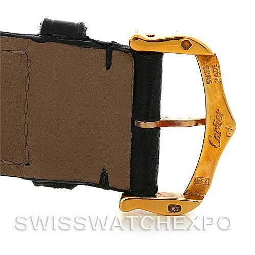 This image shows a close-up view of the clasp and part of the strap of a Cartier Tank Americaine W2603156 Men
s Yellow Gold Silver Dial W2603156 Men
s Yellow Gold Silver Dial watch.