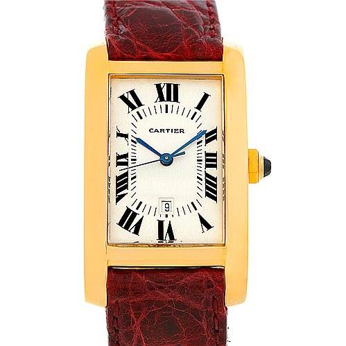 This Tank Americaine model by Cartier is shown from the front, displaying its face, hands, Roman numerals, and a part of its leather strap.