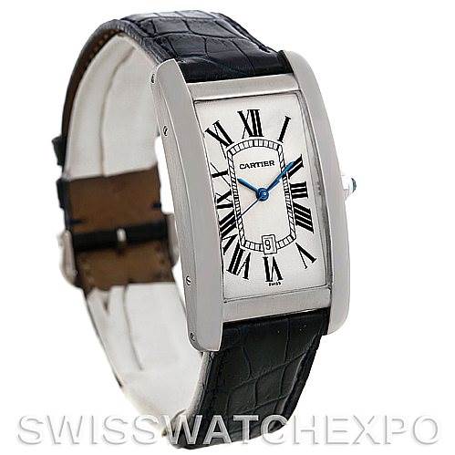 This image shows the Cartier Tank Americaine W2603256 Men's White Gold Silver Dial W2603256 Men's White Gold Silver Dial watch at a three-quarter angle, highlighting its rectangular face, Roman numerals, and black leather strap.