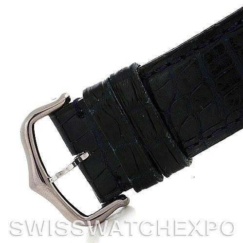 This image shows a close-up of the clasp and part of the leather strap of a Cartier Tank Americaine W2603256 Men's White Gold Silver Dial W2603256 Men's White Gold Silver Dial watch.