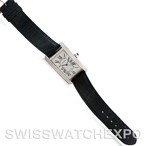 This image shows a top-down view of a Cartier Tank Americaine W2603256 Men's White Gold Silver Dial W2603256 Men's White Gold Silver Dial watch, displaying the rectangular case, dial, and black leather strap.