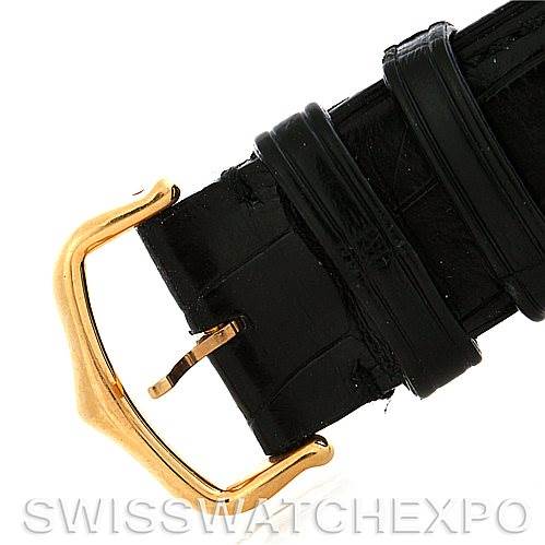 This close-up image displays the clasp and part of the leather strap of the Cartier Tank Americaine W2603156 Men
s Yellow Gold Silver Dial W2603156 Men
s Yellow Gold Silver Dial watch.