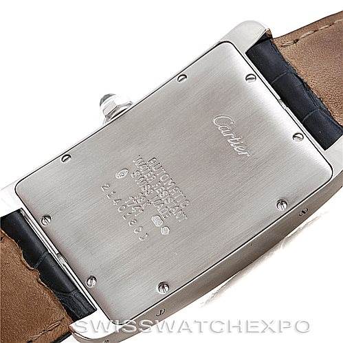The image shows the back case of a Cartier Tank Americaine W2603256 Men's White Gold Silver Dial W2603256 Men's White Gold Silver Dial watch, displaying engravings and part of the leather strap.