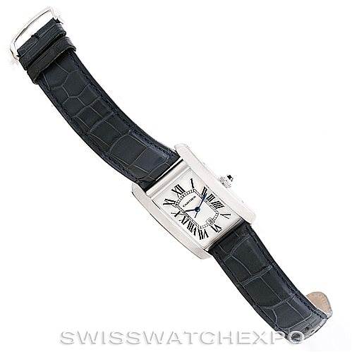 The image shows a Cartier Tank Americaine W2603256 Men's White Gold Silver Dial W2603256 Men's White Gold Silver Dial watch at a slight overhead angle, displaying the face and entire leather strap.