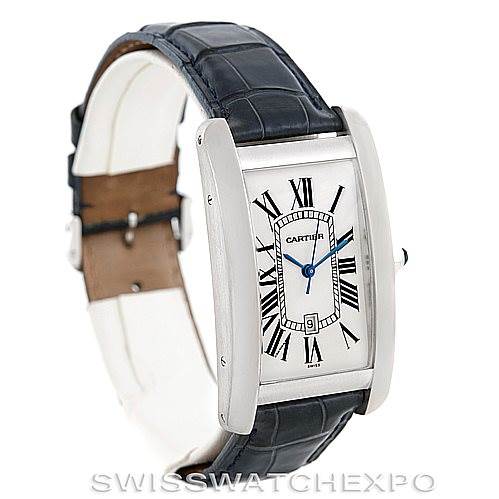 The image shows a Cartier Tank Americaine W2603256 Men's White Gold Silver Dial W2603256 Men's White Gold Silver Dial watch at a slight angled view, displaying its face, Roman numeral markers, and leather strap.
