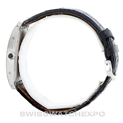 This image shows a side view of the Cartier Tank Americaine W2603256 Men's White Gold Silver Dial W2603256 Men's White Gold Silver Dial watch, highlighting the case, crown, and leather strap.