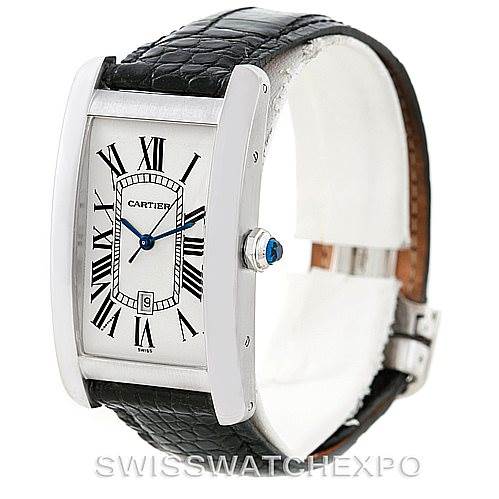 This image shows a Cartier Tank Americaine W2603256 Men's White Gold Silver Dial W2603256 Men's White Gold Silver Dial watch from a front and side angle, highlighting its rectangular dial and black leather strap.