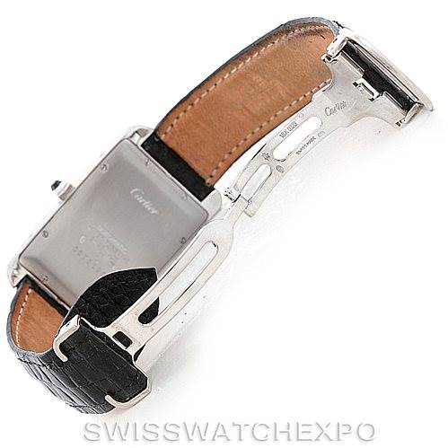 This image shows the back and clasp of the Tank Américaine model by Cartier, with the watch partially open.