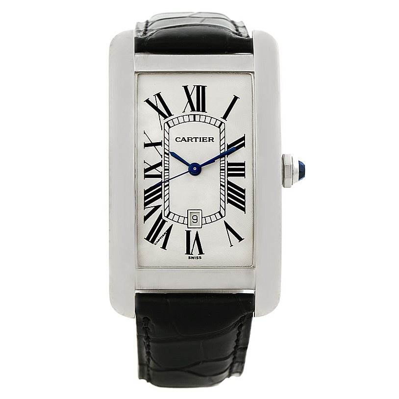 The image shows a front view of the Cartier Tank Americaine W2603256 Men
s White Gold Silver Dial W2603256 Men
s White Gold Silver Dial watch, displaying its rectangular face, Roman numerals, and leather strap.