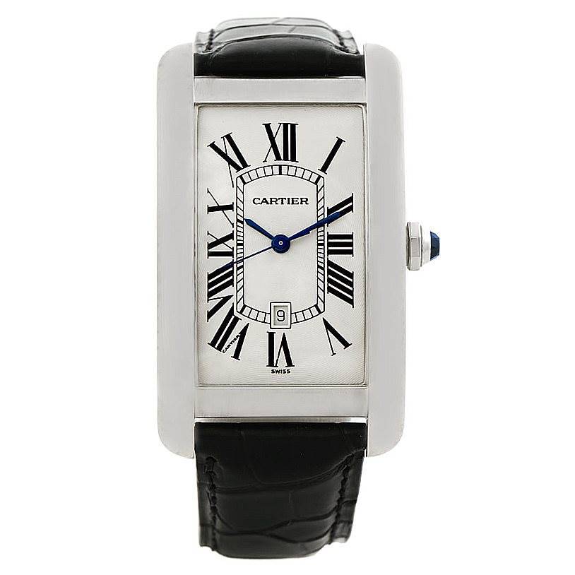 The image shows a front view of the Cartier Tank Americaine watch, displaying its rectangular face, Roman numerals, and leather strap.