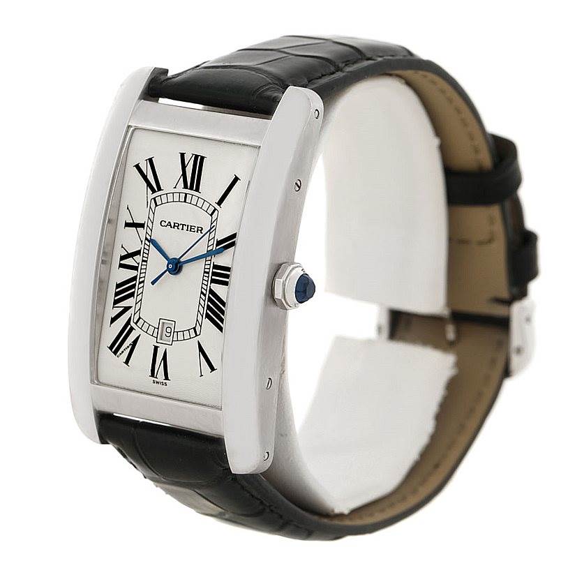 The Cartier Tank Americaine W2603256 Men
s White Gold Silver Dial W2603256 Men
s White Gold Silver Dial watch is shown at a front angle, highlighting the face, crown, and part of the strap.