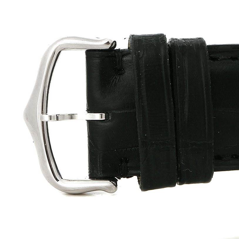 This is a close-up of the leather strap and buckle of a Cartier Tank Americaine W2603256 Men
s White Gold Silver Dial W2603256 Men
s White Gold Silver Dial watch.