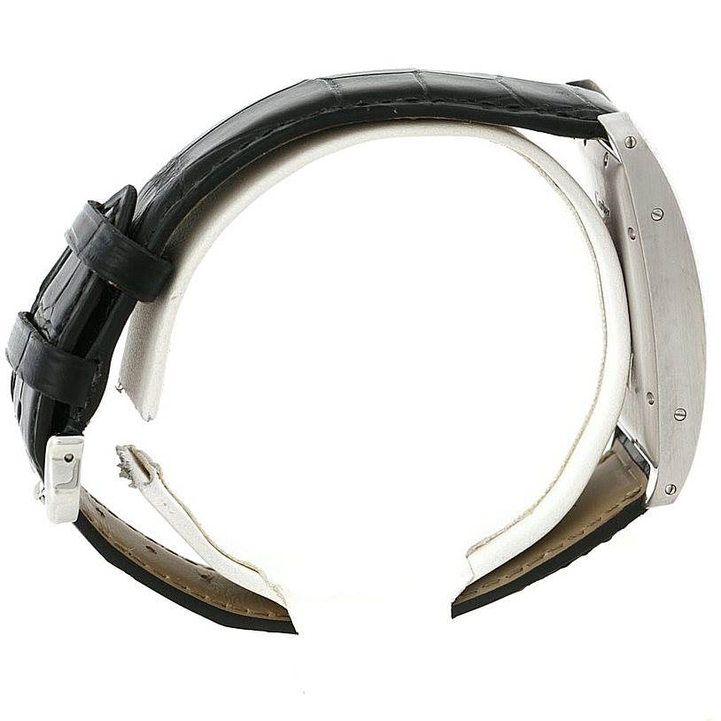 This image shows a Cartier Tank Americaine W2603256 Men
s White Gold Silver Dial W2603256 Men
s White Gold Silver Dial watch in a side profile, highlighting the case, strap, and buckle.