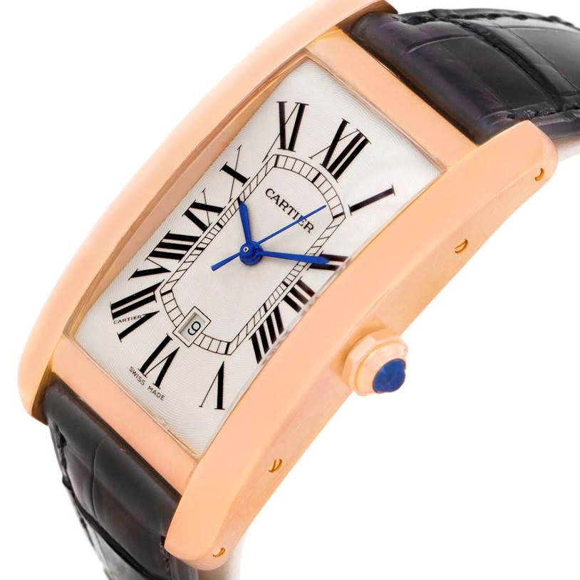 The image shows a side angle of the Cartier Tank Americaine W2609156 Men's Rose Gold Silver Dial W2609156 Men's Rose Gold Silver Dial watch, highlighting its rectangular dial, Roman numerals, and crown.