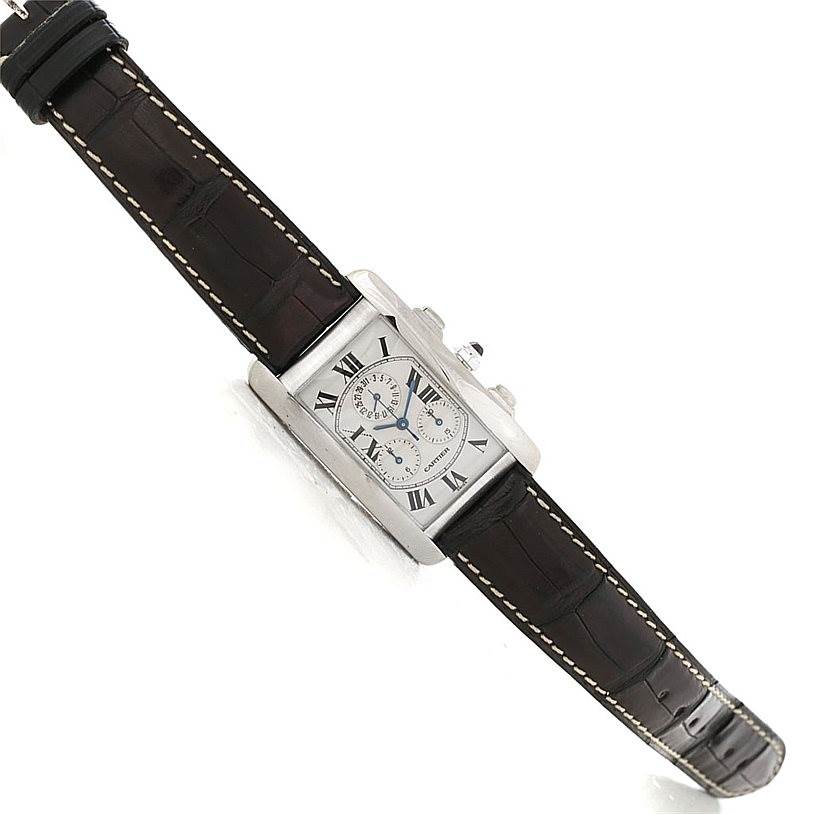 The Tank Americaine by Cartier is shown at a slight angle displaying the front face, side buttons, and the full leather strap.