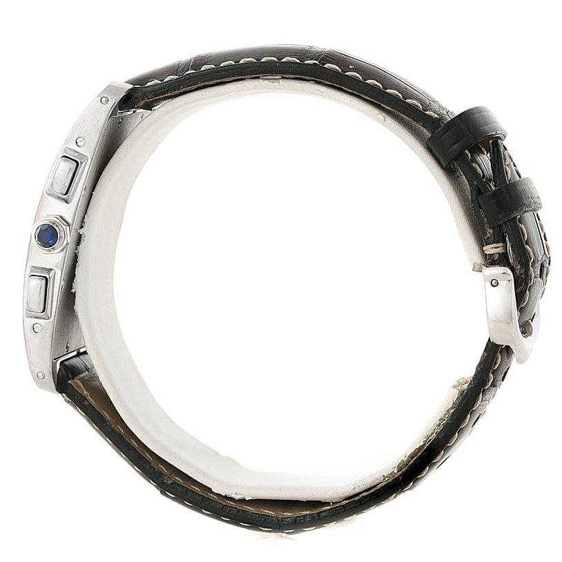 This image shows a side view of the Cartier Tank Americaine W2603358 Men's White Gold Silver Dial W2603358 Men's White Gold Silver Dial watch, highlighting its case, crown, and buttons with a leather strap.