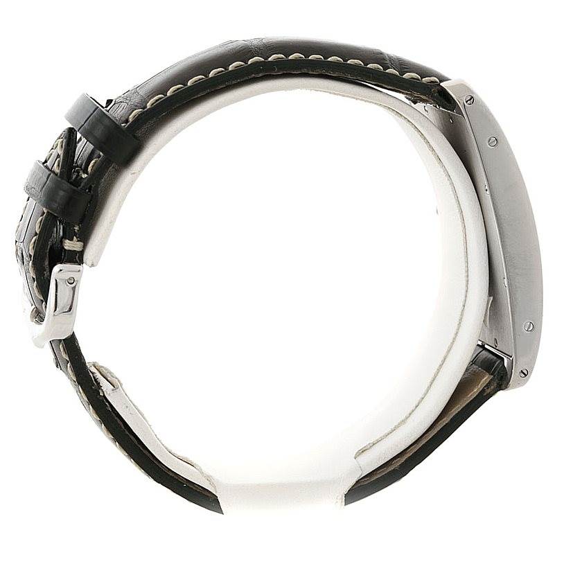 The image shows a Cartier Tank Americaine W2603358 Men's White Gold Silver Dial W2603358 Men's White Gold Silver Dial model watch from a side profile angle, highlighting the leather strap and the side of the case.