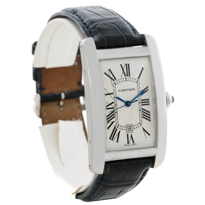 The image displays a Cartier Tank Americaine W2603256 Men's White Gold Silver Dial W2603256 Men's White Gold Silver Dial watch from a front-left angle, showcasing its face, bezel, and leather strap.