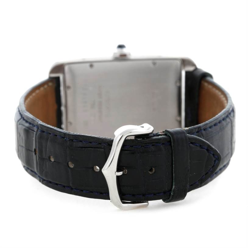 The image shows the back of a Cartier Tank Americaine W2603256 Men's White Gold Silver Dial W2603256 Men's White Gold Silver Dial watch, highlighting the strap and buckle.