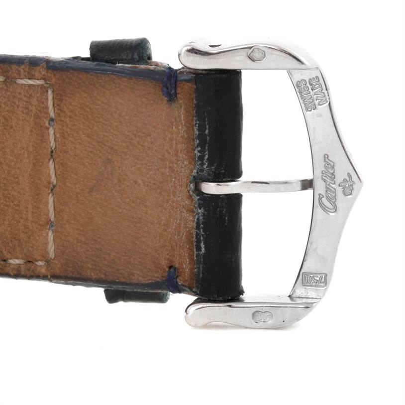 The image shows a close-up of the leather strap and buckle of the Cartier Tank Americaine W2603256 Men's White Gold Silver Dial W2603256 Men's White Gold Silver Dial watch.