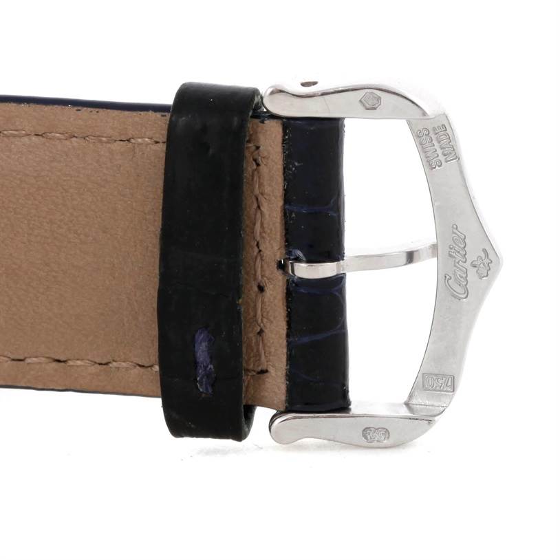 This image shows a close-up of the leather strap and buckle clasp of a Cartier Tank Americaine W2603358 White Gold Silver Dial W2603358 White Gold Silver Dial watch.