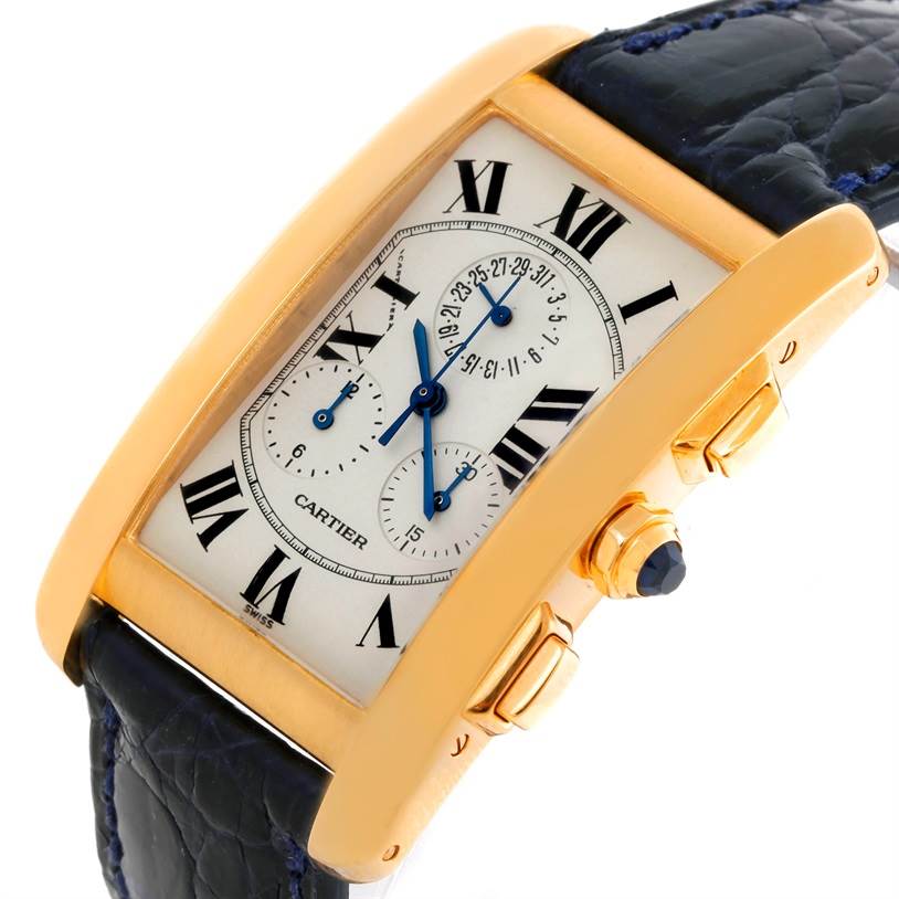 This image shows a close-up angle of the Cartier Tank Americaine W2601156 Men
s Yellow Gold Silver Dial W2601156 Men
s Yellow Gold Silver Dial watch, highlighting the dial, case, and strap.