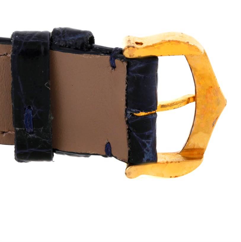 This image shows a close-up of the buckle of a Tank Americaine by Cartier watch strap.