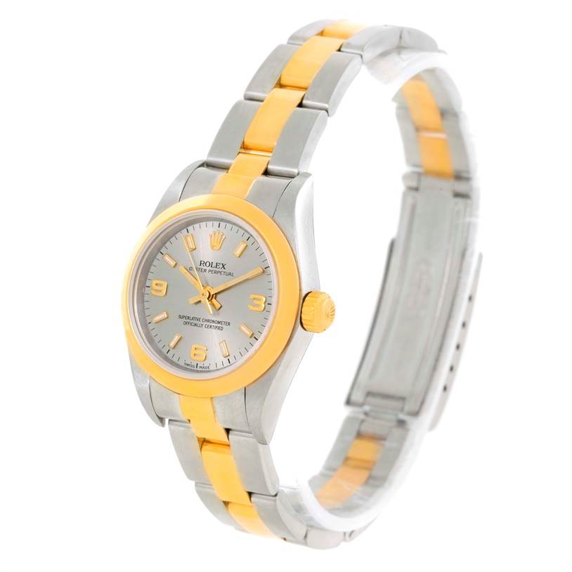 The image shows a Rolex Oyster Perpetual 76183 Women's Steel and Gold (two tone) Grey Dial 76183 Women's Steel and Gold (two tone) Grey Dial watch from a front angle, highlighting its gold and silver two-tone bracelet and bezel.