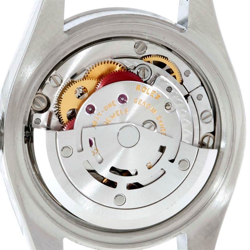 This image shows the movement and internal mechanisms of a Rolex Oyster Perpetual 176200 Women's Stainless Steel Silver Dial 176200 Women's Stainless Steel Silver Dial watch viewed from the back.